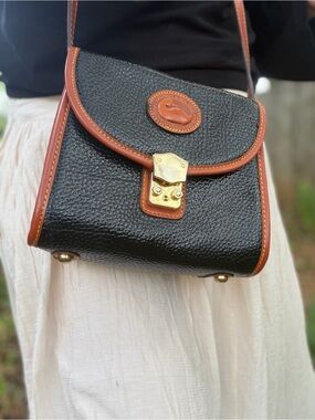 Dooney & Bourke Black Leather Crossbody with Brown Trim and Gold Hardware